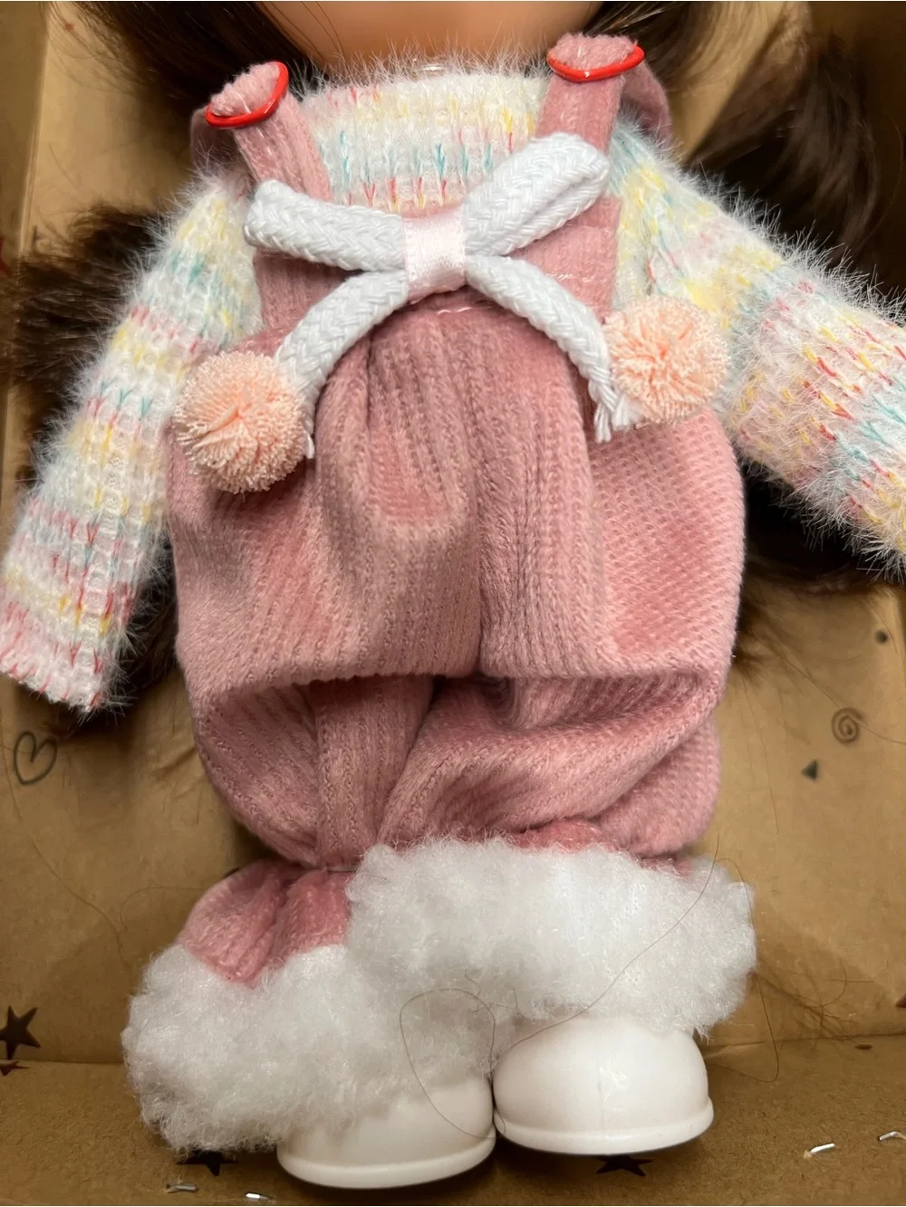 New, Mia Doll with Brown Hair Wearing a Pastel Sweater and Pink Overalls.